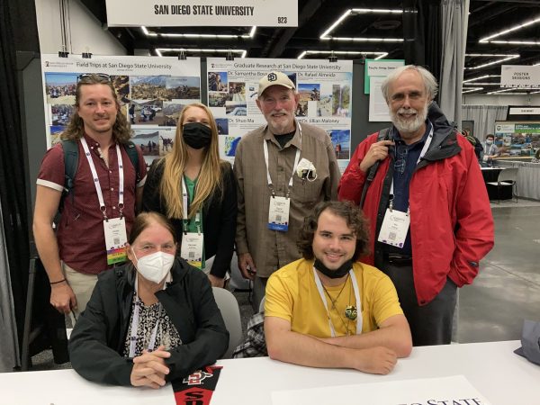 Students and faculty in the booth at GSA 2021