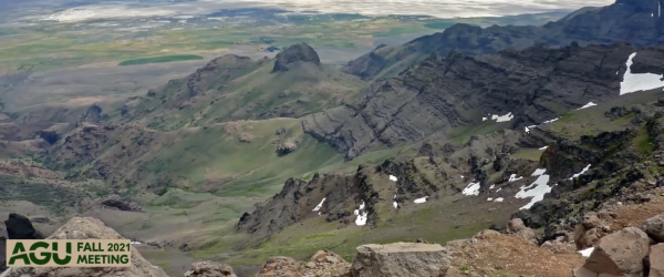 A mountainous landscape with AGU Fall 2021 Meeting in the bottom left corner